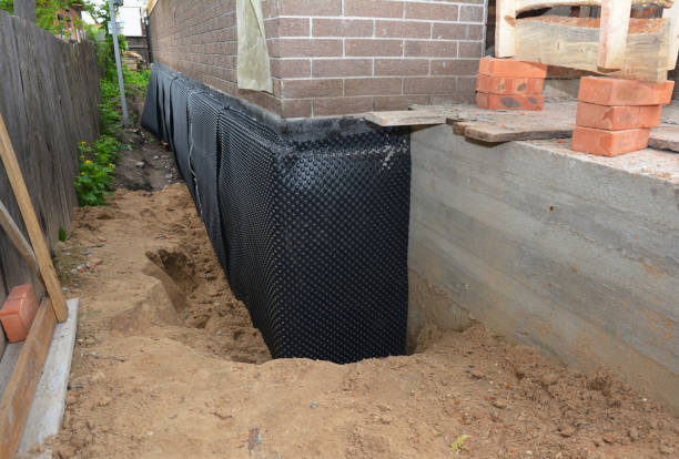 SJ Waterproofing Pros technician performing targeted Foundation Crack Repair assessment in Ashville, AL